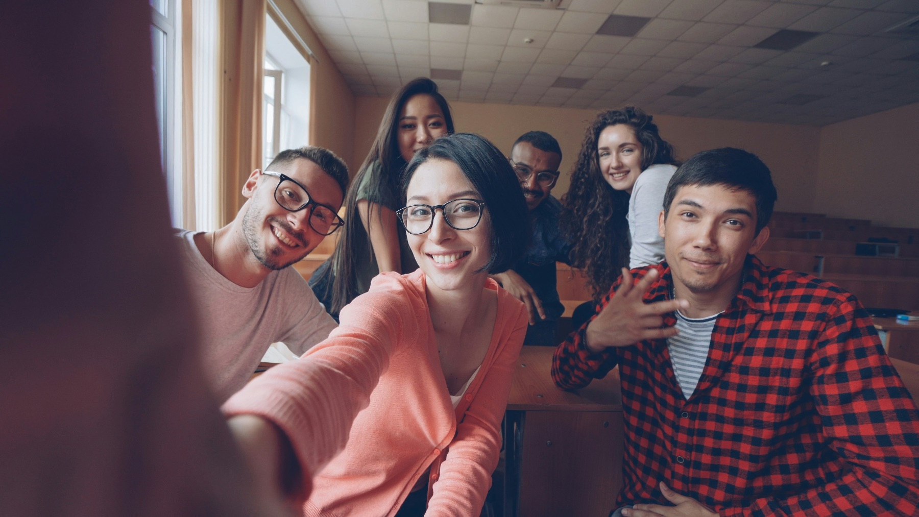 Smiling college students together